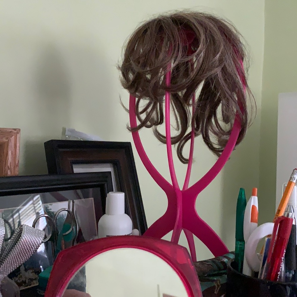 Small footprint wig stand.